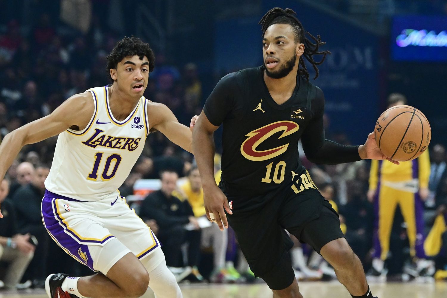 Nov 25, 2023; Cleveland, Ohio, USA; Cleveland Cavaliers guard Darius Garland (10) drives to the basket against Los Angeles Lakers guard Max Christie (10) during the first half at Rocket Mortgage FieldHouse. Mandatory Credit: Ken Blaze-USA TODAY Sports
